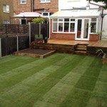Newly laid turf and new decking